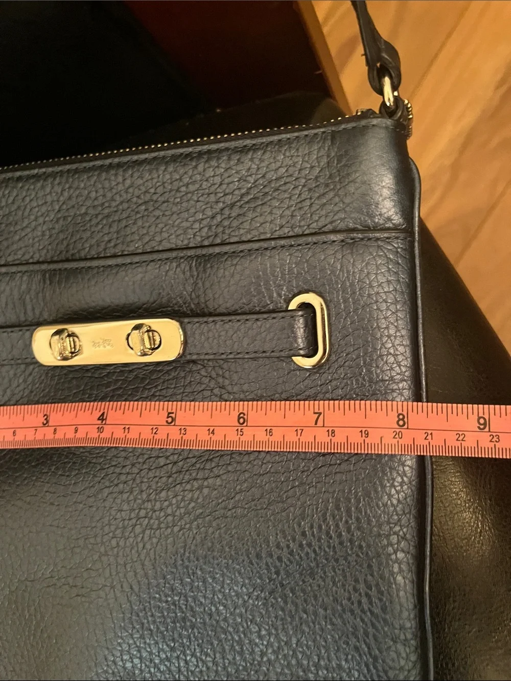 Metallic blue Coach crossbody purse